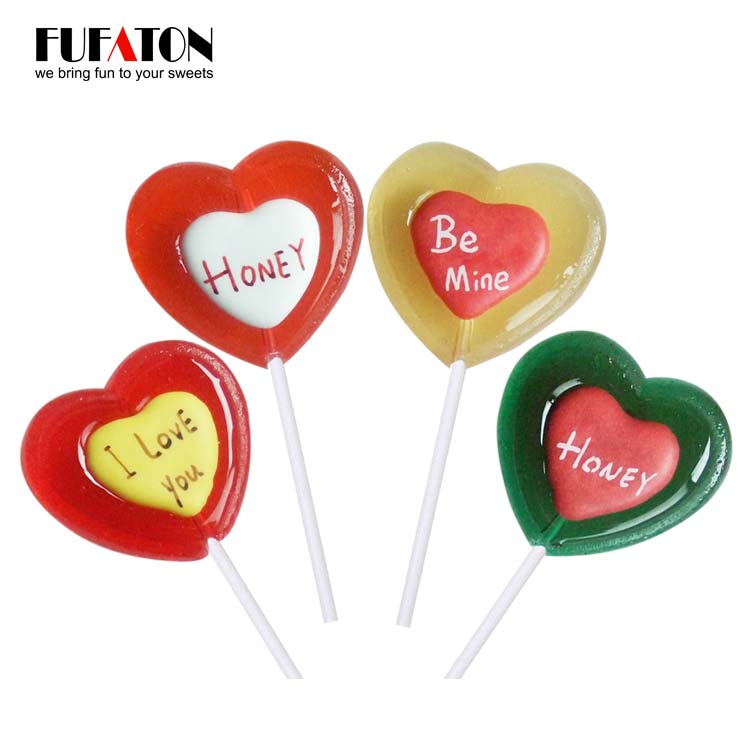 Red color Heart shaped candy lollipops